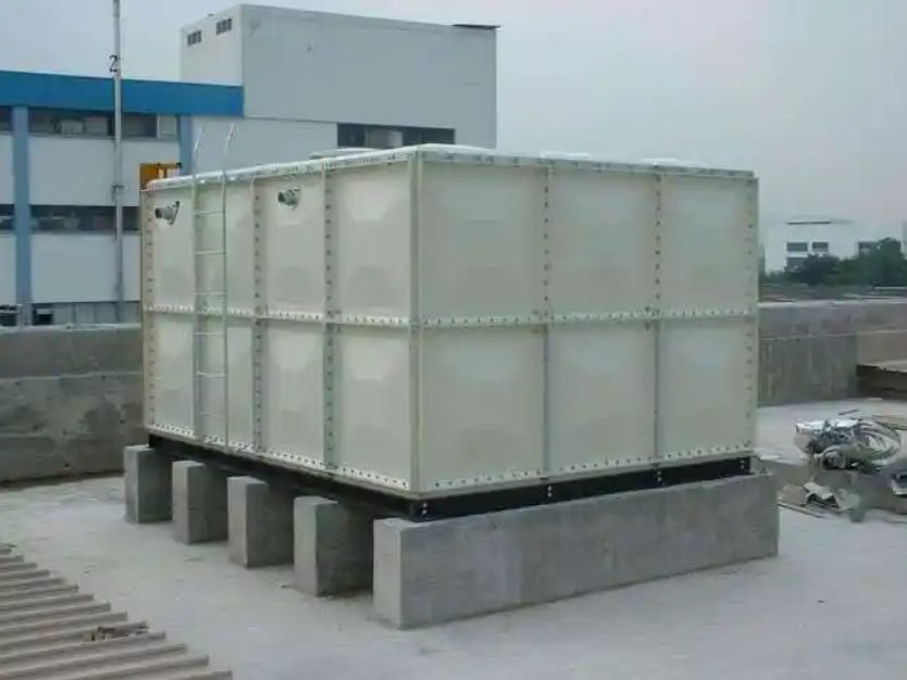 GRP water tank serving commercial building water systems